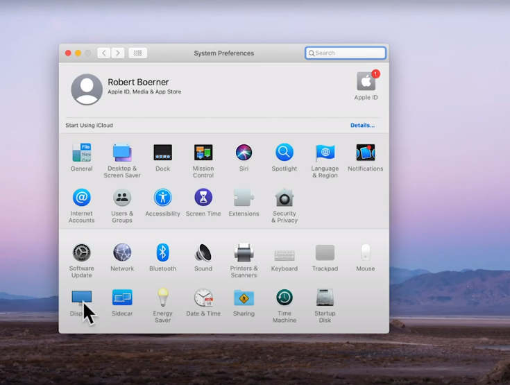 Opening System Preferences and selecting Displays