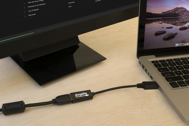 DP to HDMI passive adapter connected to computer and monitor