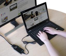 Thumbnail of Plugable's VGA adapter in use, connecting a laptop to an external display