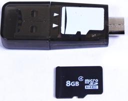 Thumbnail of Scale image with a microSD card of the USB 2.0 MicroSD card reader for phone, laptop, and tablet