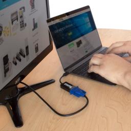 Thumbnail of Image of the Plugable graphics adapter in use, connecting a laptop to a secondary display
